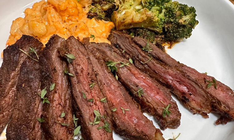 Thyme and Cumin Marinated Skirt Steak with Cauliflower Mac and Garlic Butter Broccoli