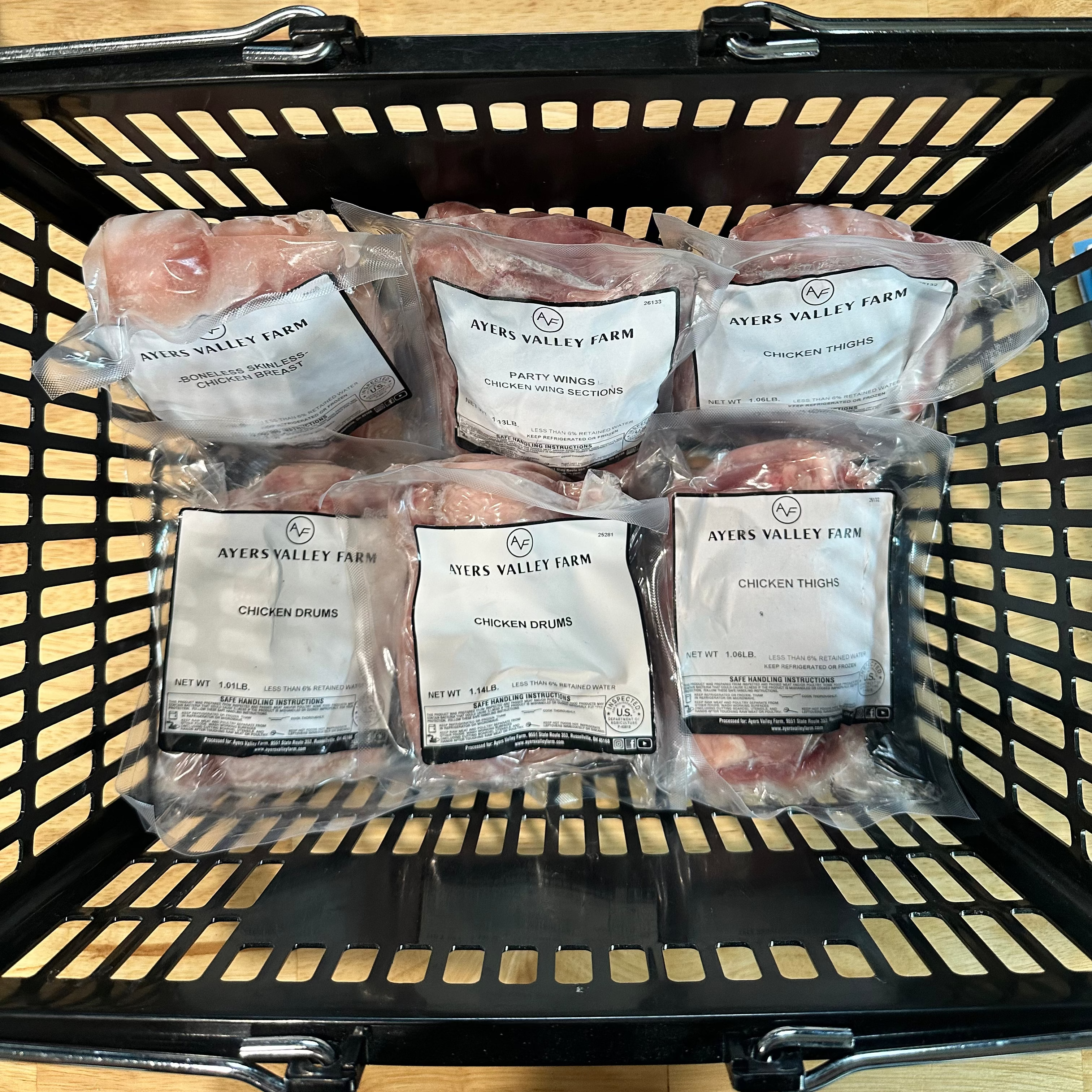 Soy and corn free chicken products in basket on counter at Ayers Valley Farm
